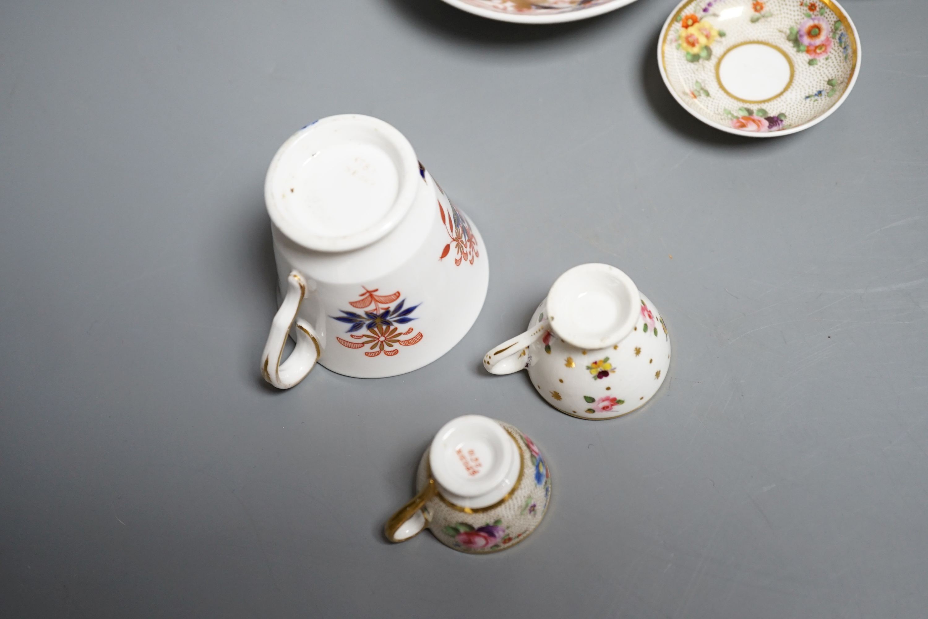 Three Spode miniature teacups and saucers, c.1815. Provenance - Mona Sattin collection of miniature cups and saucers, collection no.s 120, 121 & 130.